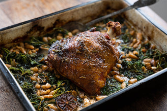 Whole Baked Shoulder of Lamb with White Beans & Nettles, by Gill Meller