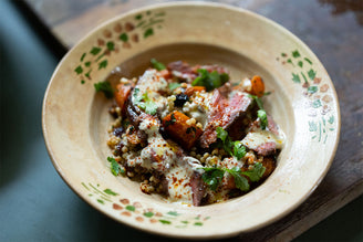 Lamb Neck Fillet, Mograbieh, Roasted Carrot & Tahini Sauce, by Julius Roberts