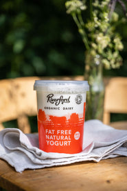 a tub of riverford dairy fat free yogurt on a table 