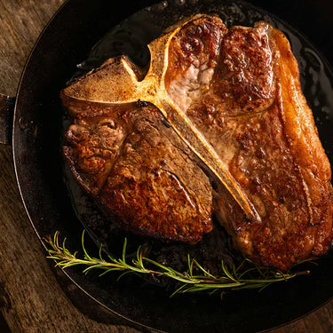 Cooked T Bone steak in skillet