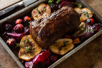 A cooked Venison Saddle Fillet with Roasted Orchard Fruit.