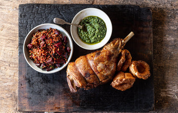 Cooked Leg of Lamb Served With Sides