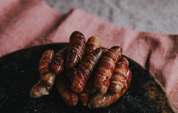 Sausages wrapped in Bacon from Pipers Farm